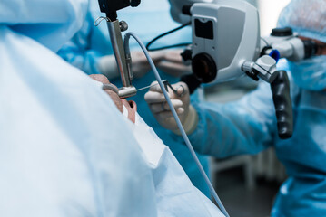 Microlaryngoscopy, laryngoscope. removal of benign laryngeal neoplasms using an ENT surgical...