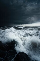Obraz premium Waves crashing on rocky shore during storm, ocean, water sports background