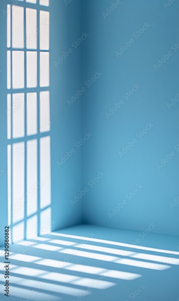 Poster soft shadows create a tranquil atmosphere in a blue-walled corner illuminated by sunlight streaming 