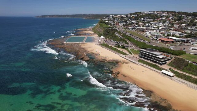 Merewether Ocean Baths With View Of Tasman Sea In Newcastle, NSW, Australia. aerial shot