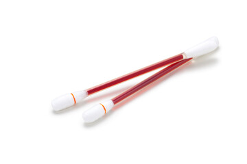 Iodine cotton swabs on white background
