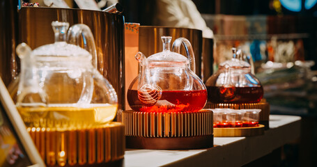 Chengdu, Sichuan, China. Kettle Tea. Sale Of Chinese Berry Flower Tea. Fruit Flower Tea. Asian Cuisine. Glass Teapot. brewed Tea for delicious and healthy beverage