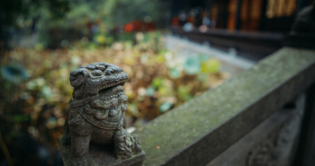 Obraz premium Chengdu, Sichuan, China. Old Stone Sculptures Of Kylins Or Qilin Park Of Wuhou Memorial Temple. Traditional Chinese Architectural Ornament. Qilin Legendary Hooved Chimerical Creature That Appears In