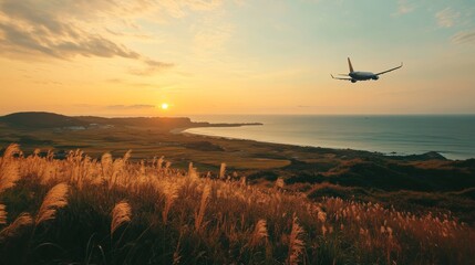 Obraz premium Beautiful Sunset Over Coastal Cliffs With an Airplane Flying in the Sky Near a Serene Beach at Dusk