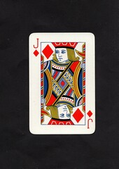 A diamonds playing card isolated on a black background.