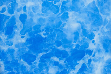 Fototapeta premium Blue and White Marbled Water Surface with Light Reflections Creating an Abstract Fluid Pattern. Generative Ai