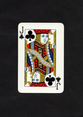 A clubs playing card isolated on a black background.
