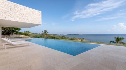 Fototapeta premium Modern villa pool overlooking ocean view