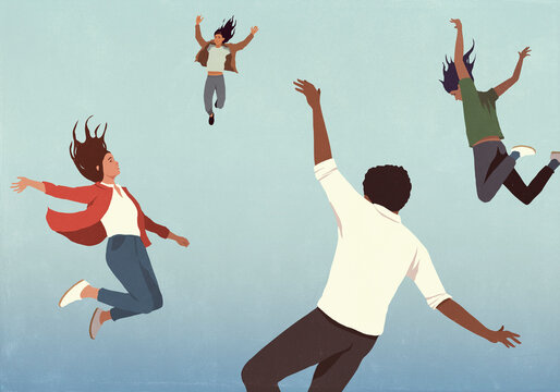 People with arms raised free falling from blue sky
