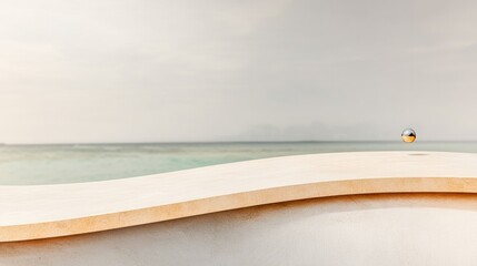 Fototapeta premium Serene coastal landscape featuring smooth curves and tranquil wa