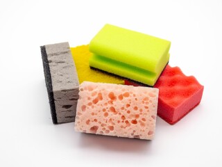 Assorted cleaning sponges on white background