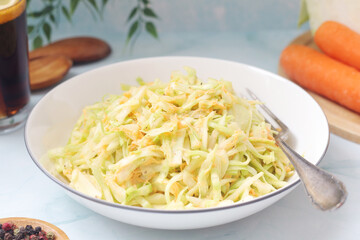 A bowl with coleslow salad