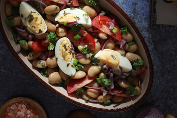 A bowl with Piyaz salad - traditional dish of Turkey