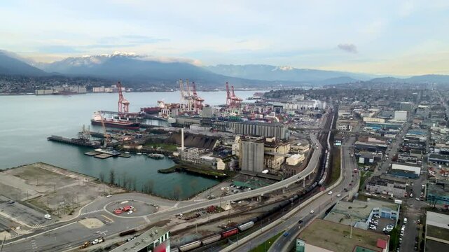 Industrial Terminal Of Cargo Ship Along Downtown Eastside In Vancouver, Canada. - aerial shot