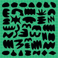 Abstract black shapes on a green grid background. Unique shapes, bold shapes, creative shapes. Artistic design with abstract shapes and green grid. Funky shapes vector set.
