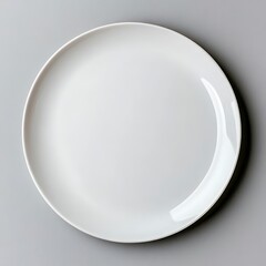 Overhead View of a White Round Plate on a Grey Background