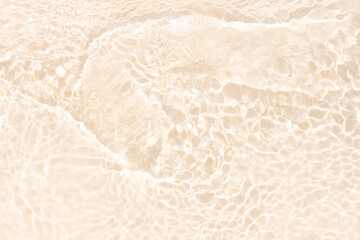 Sand water texture background. Gray water with ripples on the surface. Defocus blurred transparent white colored clear calm water surface texture with splashes and bubbles. Water waves with shining.