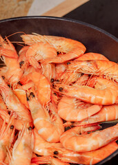 Cooking shrimp in a deep frying pan