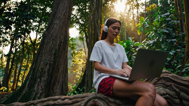 Digital Nomad Working in Southeast Asian Jungle: A Lush and Untamed Natural Paradise