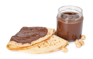 Tasty crepes with chocolate butter isolated on white