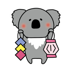 七夕飾りを持っているコアラ