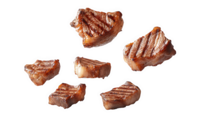 several pieces of grilled meat. displaying a tantalizing charred texture and rich color. suggesting a delicious and appetizing dish the floating arrangement emphasizes the quality and appeal of the me