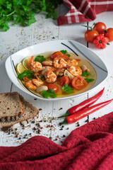 Soup with shrimps, chili peppers and spices first course