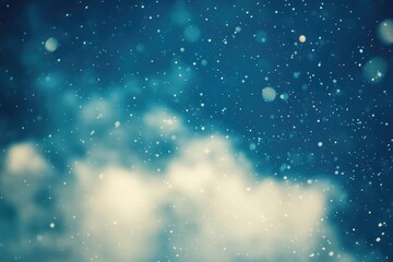 Fototapeta premium Clear blue sky with scattered white clouds and snowflakes falling from above
