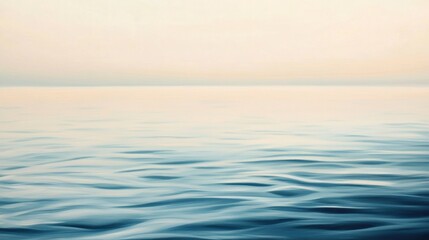 Fototapeta premium Calm ocean water surface at sunrise, gentle ripples reflecting light, serene nature scene, tranquil seascape for relaxation and meditation themes.