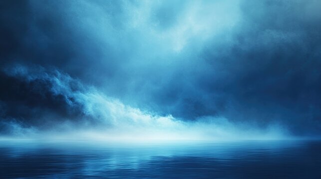 Calm ocean surface reflecting moody blue sky, dramatic clouds, tranquil waters, serene landscape, atmospheric seascape, nature background for meditation.