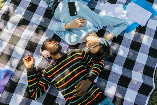 Relaxing Moment with Friends Listening to Music Outdoors