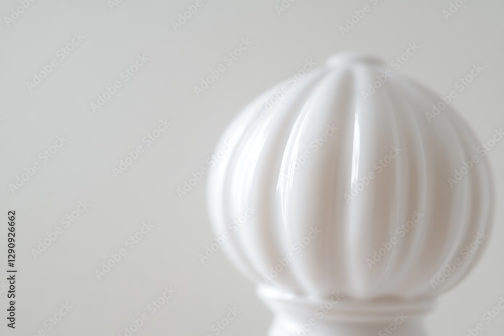 Poster a simple still life image of a white vase sitting on a table