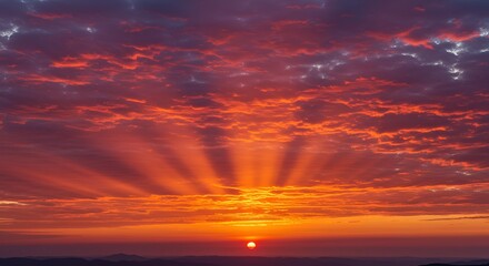 Fototapeta premium Vivid sunset sky with glowing clouds, deep orange and pink hues, sunbeams spreading through the sky, ultra-detailed, photorealistic, ultra HD, crystal clear sharpness, professional DSLR quality