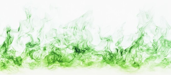 Fototapeta premium Green smoke wisps rise dynamically against a clean white backdrop creating a striking contrast with their soft, flowing curves and vibrant tones.