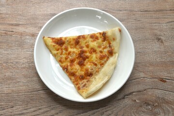 piece of baking homemade pizza topping truffle on plate 