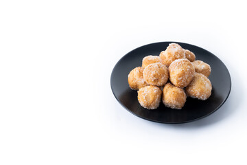 Traditional Carnival fritters or buñuelos e viento isolated on white background. Copy space