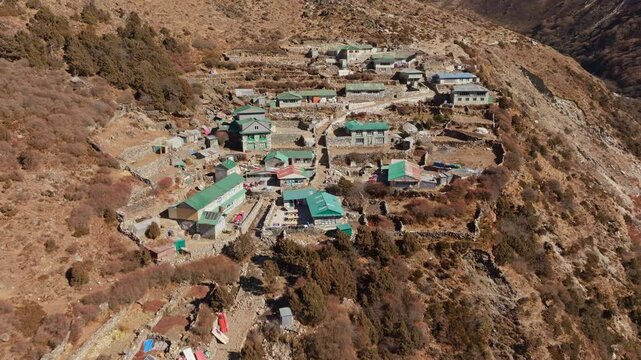 Picturesque Himalayan village of Shomare nestling in eastern Nepal Khumbu region, serving as key waypoint for trekkers approaching Mount Everest Base Camp