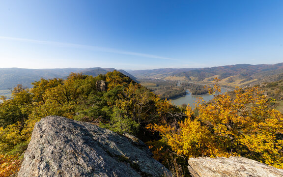 View of colorful autumn mountain landscape with forest and rocks, Wachau Valley, Austria.