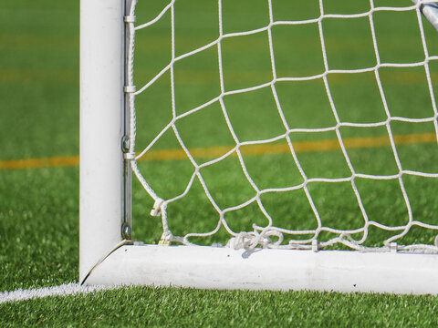 Close up of soccer goal post on artificial turf field