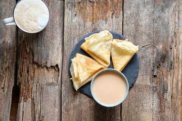 crepes with red orange cream