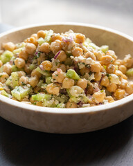delicious healthy salad with chickpeas, cucumber, and feta cheese close-up