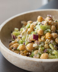delicious healthy salad with chickpeas, cucumber, and feta cheese close-up