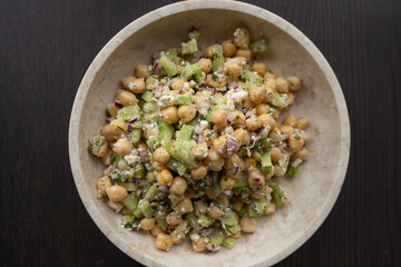 delicious healthy salad with chickpeas, cucumber, and feta cheese close-up