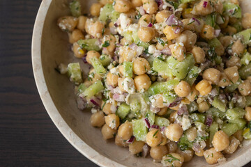 delicious healthy salad with chickpeas, cucumber, and feta cheese close-up