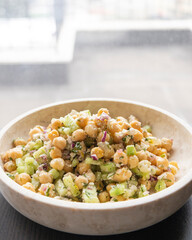 delicious healthy salad with chickpeas, cucumber, and feta cheese close-up