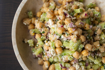 delicious healthy salad with chickpeas, cucumber, and feta cheese close-up