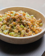 delicious healthy salad with chickpeas, cucumber, and feta cheese close-up