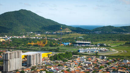 Aerial photograph from a distance of Beto Carrero World theme park, located in Penha, Santa Catarina, Brazil.