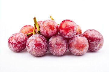 Obraz premium Fresh red grapes arranged on a clean white surface, perfect for food photography or still life compositions