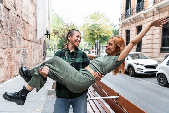 Colombian lesbian couple embracing love and diversity outdoors